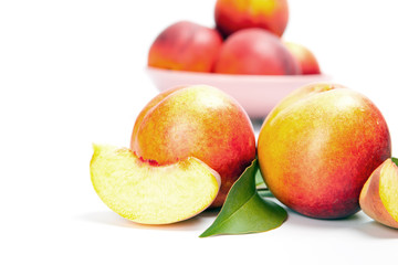 Ripe peach (nectarine)  isolated on white background