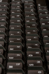 Obraz premium Black keyboard closeup. Keyboard pattern. Horizontal pattern. Vertical pattern.