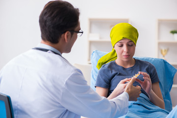 Cancer patient visiting doctor for medical consultation in clini