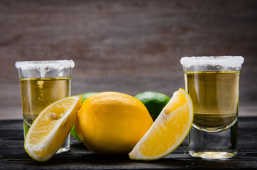 Tequila drink served in glasses with lime and salt