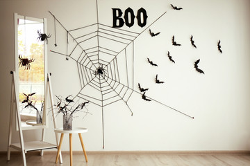 Floor mirror and creative decor for Halloween party indoors