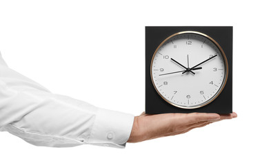 Man with clock on white background. Time management concept