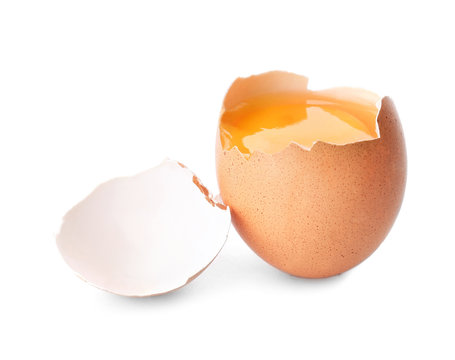 Raw chicken egg with yolk on white background