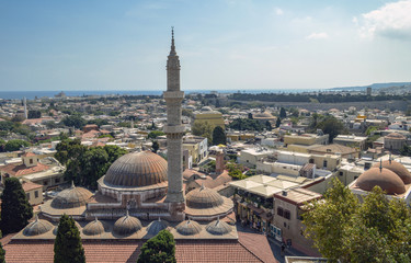 Fototapeta premium A view from above of the ancient mosque and the old town of Rhodes.