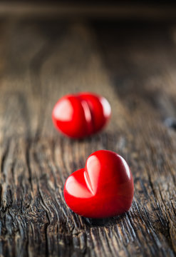 Valentines red heart. One two red heart on wooden table. Wedding or valentine day
