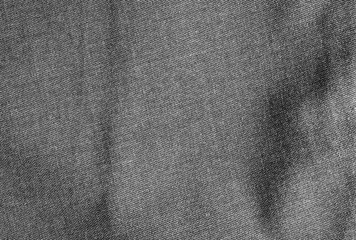 Dark grey fabric texture with delicate striped pattern.