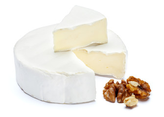 Round brie or camambert cheese on a white background