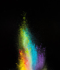 Launched colorful powder, isolated on black background