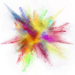Explosion of colored powder on white background