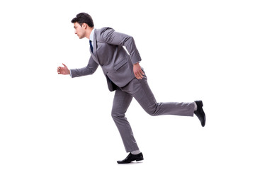 Young businessman running forward isolated on white