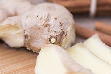 Healthy herbal tea,  spiced tea over wood background 