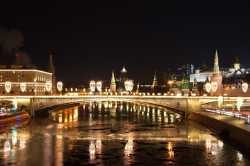 Evening view of Moscow Kremlin and Big Moskvoretsky bridge with Christmas illumination, Moscow, Russia