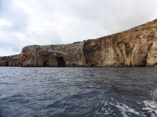 huge island cliffs on sea low angle view 