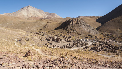 Panorama of abandoned and decaying houses in San Antonio de Lipez ghost village at the footstep of San Antonio volcano in the Bolivian altiplano