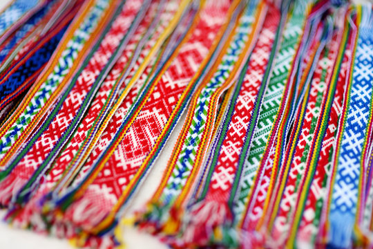 Details of a traditional colorful Lithuanian weave. Woven belts as a part of national Lithuanian costume.