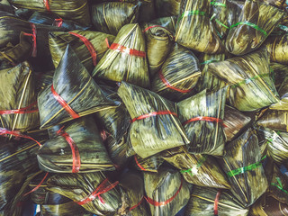Sweet sticky rice packaging design (Dragon Boat Festival or Zongzi) a sale in local market at Tang, Thailand