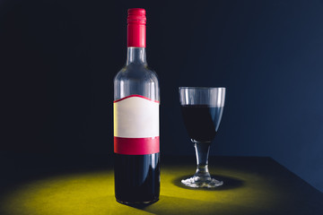 Wine bottle and glass of red wine