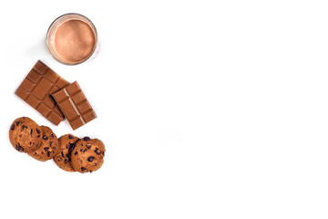 Chocolate milk with cookies on blue background with space for text or design. Top view