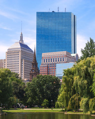 Boston Public Garden. Lake overlooking the Skyline of downtown district office. Boston, Massachusetts, USA
