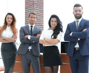 Happy smiling business team in office