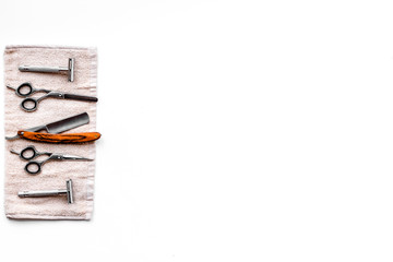 Tools beard and moustaches' care. Razor, brush and sciccors on white background top view copy space