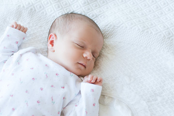 a newborn has a healthy day's sleep. sweet dreaming. happy motherhood. copy space concept.