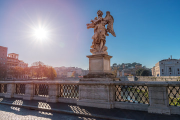 Rome, Italy. Bridge Sant Angelo on Tiber river. Sunset.