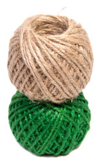 Skein of natural jute twine isolated on white.