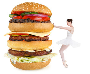 Slim balerina rejecting big burger to stay fit © Prostock-studio