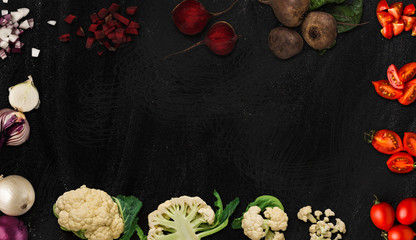 Collage of various vegetables on black background, isolated