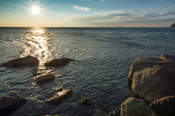 reflections at sunset on the winter sea on a sunny day