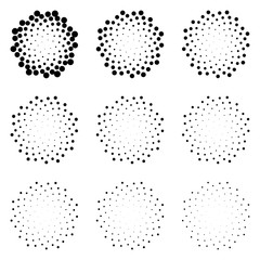 Halftone dotted circles isolated on the white background. Halftone effect vector pattern. Randomly distributed dots for your design.