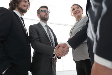 business people handshaking after good deal.