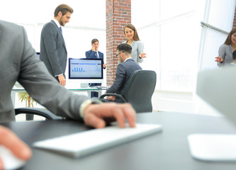 elegant professional businessman working on the computer