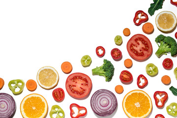 Assorted sliced vegetables and fruits on white background.  Flat lay. Food vegan concept.