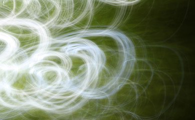 Abstract Curls of White Light on Green Background
