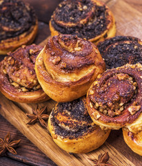 baked round buns with poppy seeds and nuts
