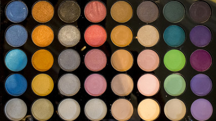 Palette of colorful eye shadow makeup