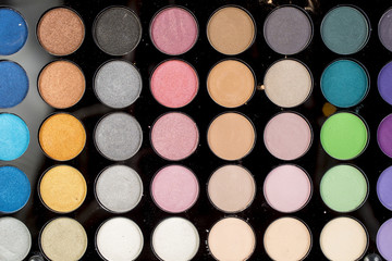 Palette of colorful eye shadow makeup