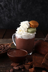 Hot chocolate or coffee with whipped cream in glass