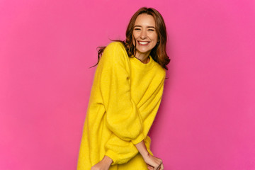Charming beautiful girl , smiling widely, waiting for Valentine's day. Dressed in yellow sweater....