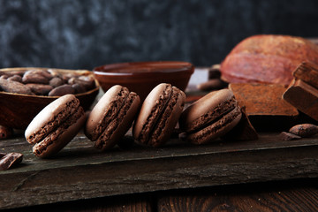 Sweet and colourful french macaroons or macaron on wooden background, Dessert