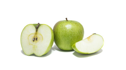 Green apples and apple slices isolated on white background