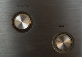 Close up of a high tech media preamplifier level buttons