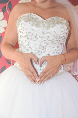 bride's hands in the shape of heart