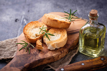 Toasted bread with olive oil and rosemary