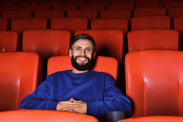 Young man watching movie in cinema © Africa Studio