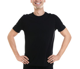 Young man in color t-shirt on white background. Mockup for design