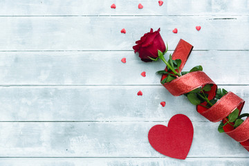 Red rose with hearts for Valentines day background