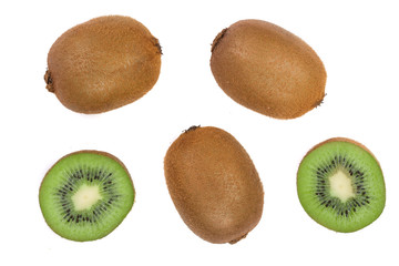 Kiwi fruit with slices isolated on white background, close-up. Top view. Flat lay pattern